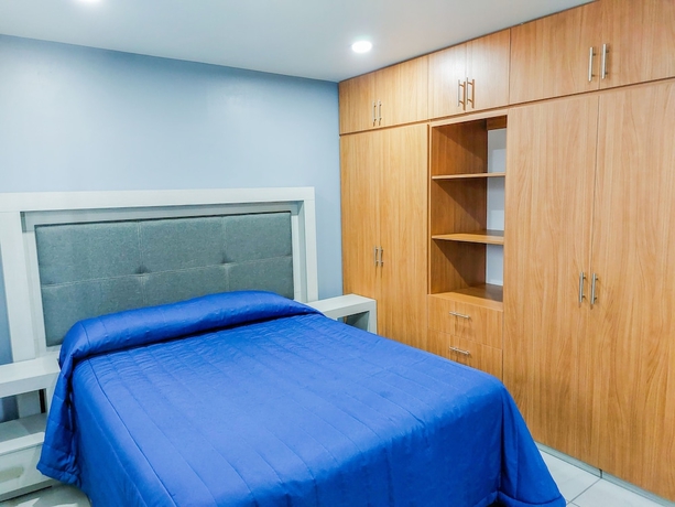 Imagen de la habitación del Hotel Villas Analco Apartments. Foto 6