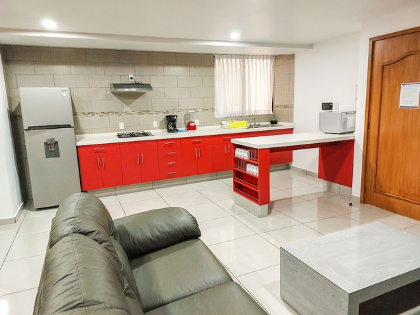 Imagen de la habitación del Hotel Villas Analco Apartments. Foto 7