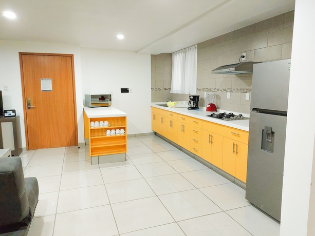 Imagen de la habitación del Hotel Villas Analco Apartments. Foto 8