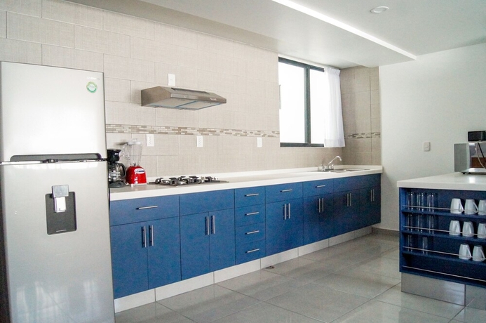 Imagen de la habitación del Hotel Villas Analco Apartments. Foto 12