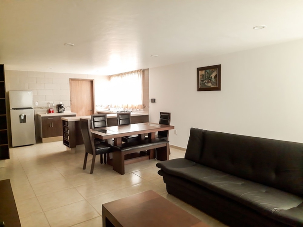 Imagen de la habitación del Hotel Villas Analco Apartments. Foto 13