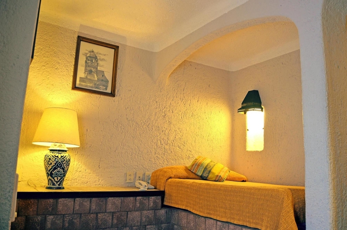 Imagen de la habitación del Hotel Villas Arqueol&oacute;gicas Cholula. Foto 7