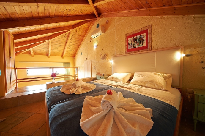 Imagen de la habitación del Hotel Villas Cavo Marathia. Foto 7