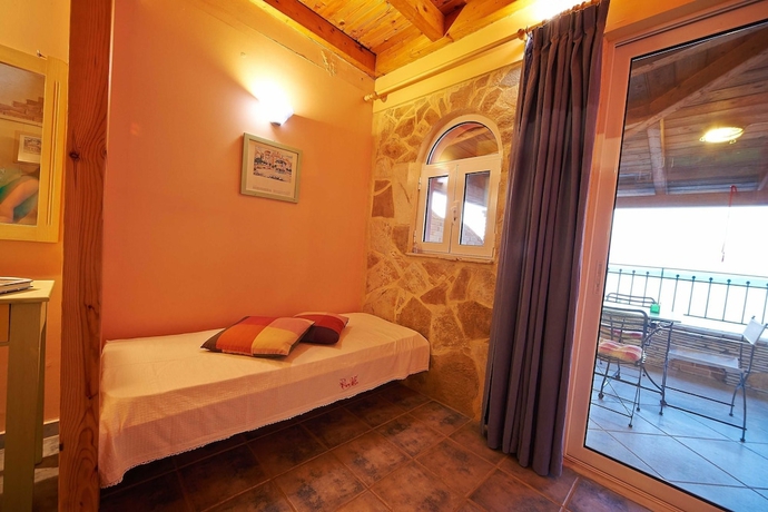 Imagen de la habitación del Hotel Villas Cavo Marathia. Foto 11