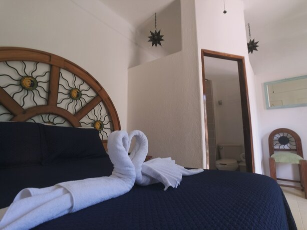 Imagen de la habitación del Hotel Villas Chulavista. Foto 17