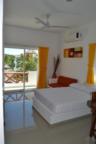 Imagen de la habitación del Hotel Villas Coco Mango. Foto 1