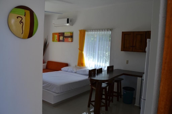 Imagen de la habitación del Hotel Villas Coco Mango. Foto 4