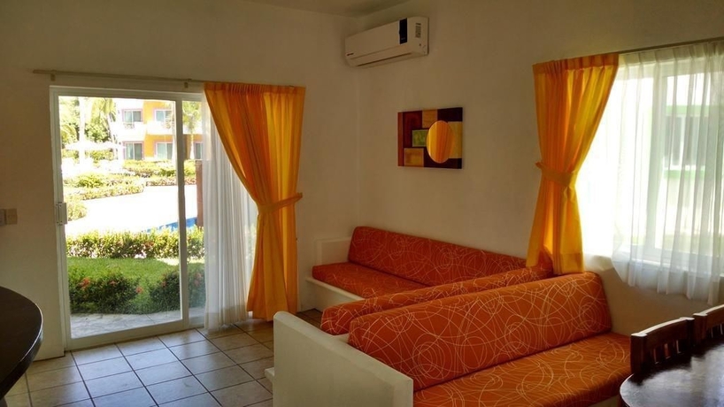 Imagen de la habitación del Hotel Villas Coco Mango. Foto 7