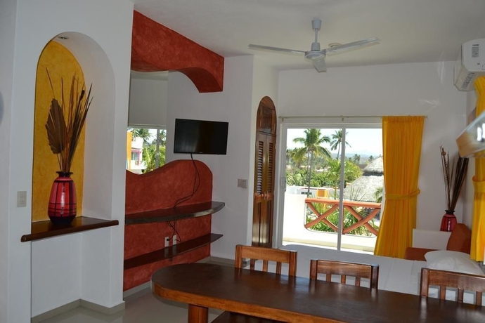 Imagen de la habitación del Hotel Villas Coco Mango. Foto 8