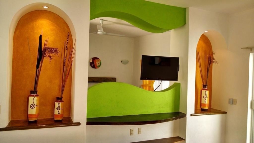 Imagen de la habitación del Hotel Villas Coco Mango. Foto 9