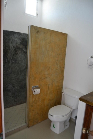 Imagen de la habitación del Hotel Villas Coco Mango. Foto 10