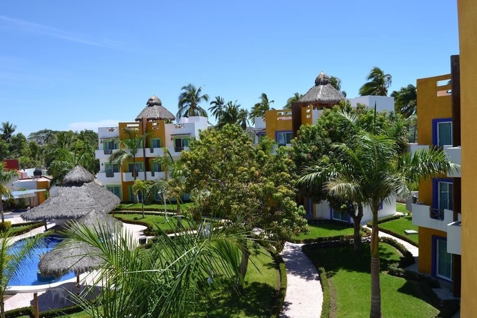 Imagen de los exteriores del Hotel Villas Coco Mango. Foto 16