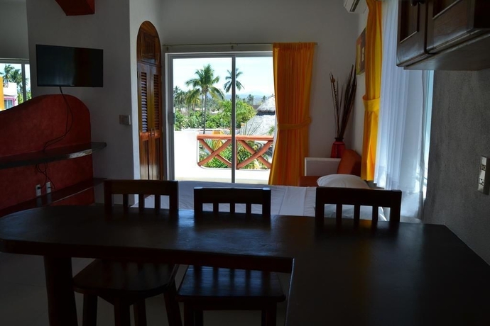 Imagen de la habitación del Hotel Villas Coco Mango. Foto 12