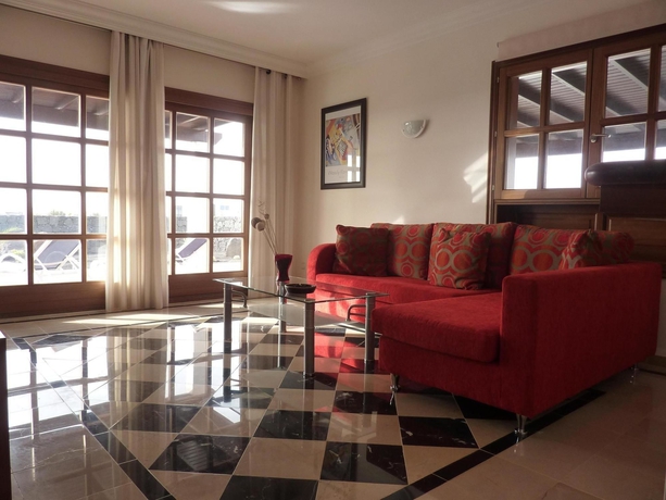 Imagen de la habitación del Hotel Villas Coral Deluxe. Foto 3