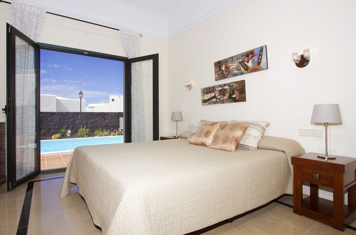 Imagen de la habitación del Hotel Villas Coral Deluxe. Foto 4