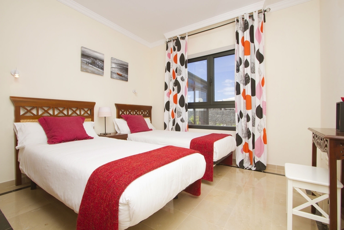 Imagen de la habitación del Hotel Villas Coral Deluxe. Foto 6