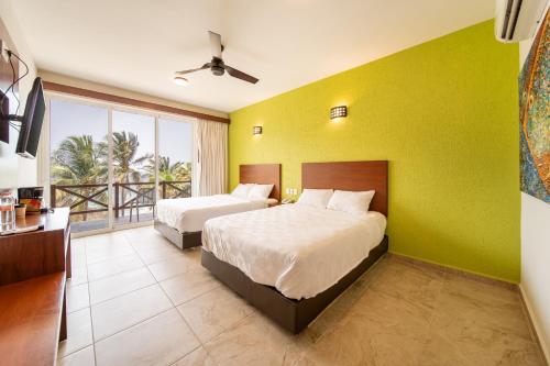 Imagen de la habitación del Hotel Villas Coral Huatulco. Foto 14