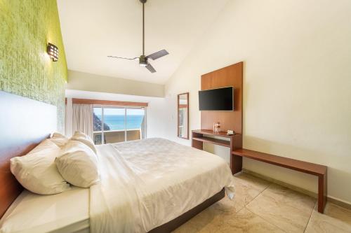Imagen de la habitación del Hotel Villas Coral Huatulco. Foto 17