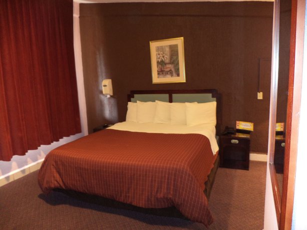 Imagen de la habitación del Hotel Villas De Santiago Inn. Foto 10