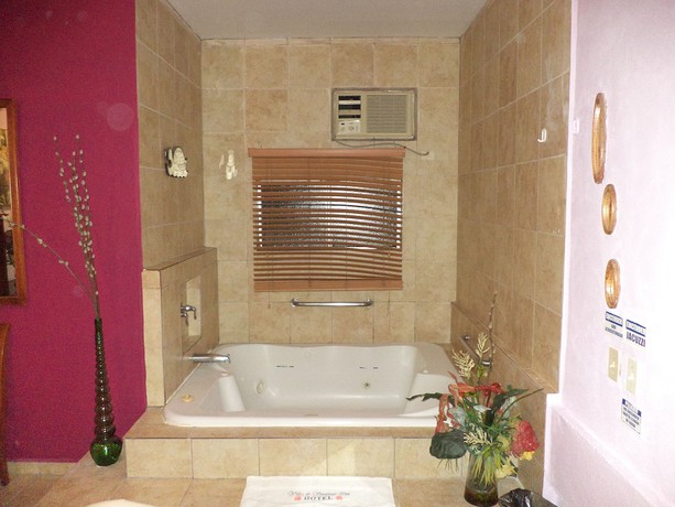 Imagen de la habitación del Hotel Villas De Santiago Inn. Foto 11