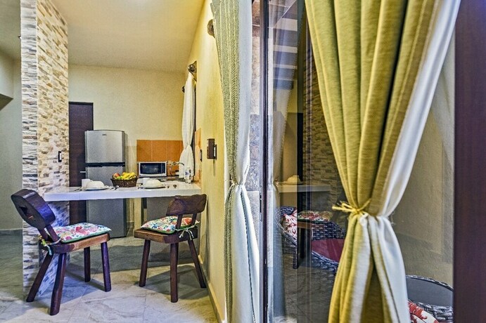 Imagen de la habitación del Hotel Villas El Jardín. Foto 4