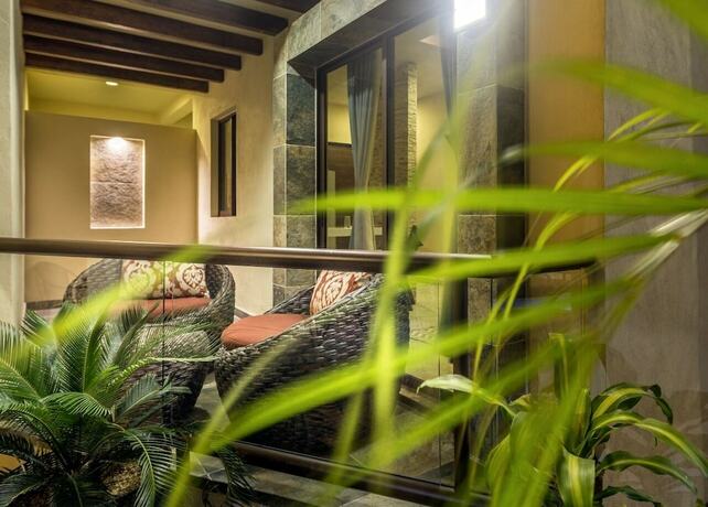 Imagen de la habitación del Hotel Villas El Jardín. Foto 7