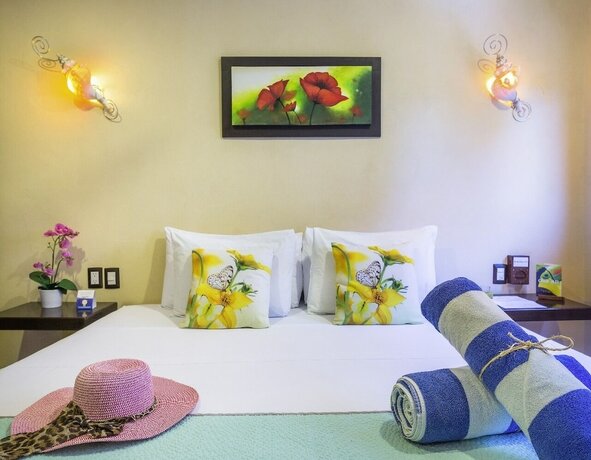 Imagen de la habitación del Hotel Villas El Jardín. Foto 8