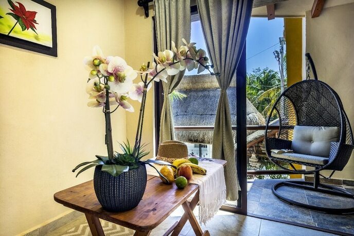 Imagen de la habitación del Hotel Villas El Jardín. Foto 11