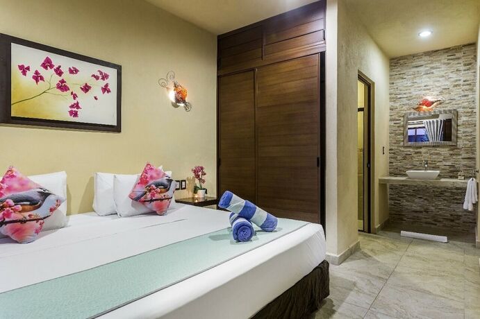 Imagen de la habitación del Hotel Villas El Jardín. Foto 12