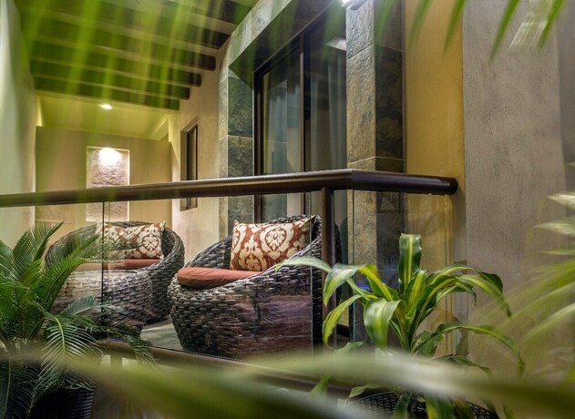 Imagen de la habitación del Hotel Villas El Jardín. Foto 13