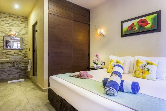 Imagen de la habitación del Hotel Villas El Jardín. Foto 15