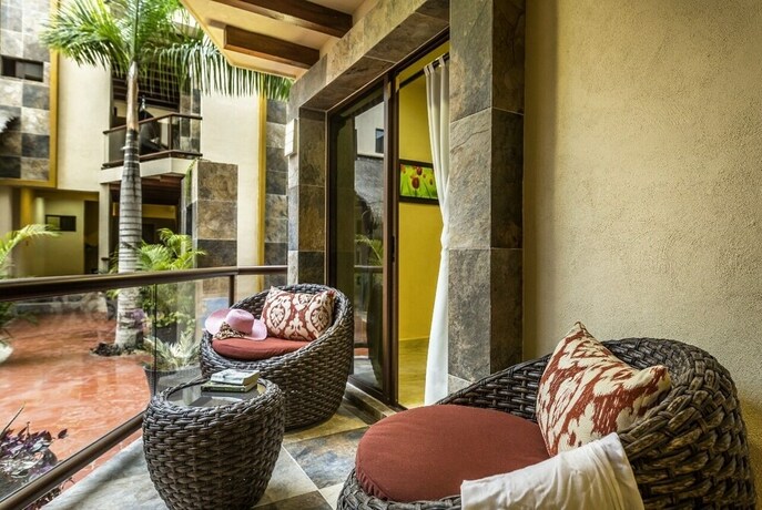 Imagen de la habitación del Hotel Villas El Jardín. Foto 17