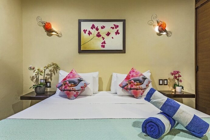 Imagen de la habitación del Hotel Villas El Jardín. Foto 18