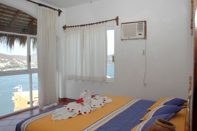 Imagen de la habitación del Hotel Villas El Morro. Foto 7