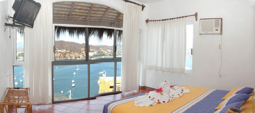 Imagen de la habitación del Hotel Villas El Morro. Foto 8