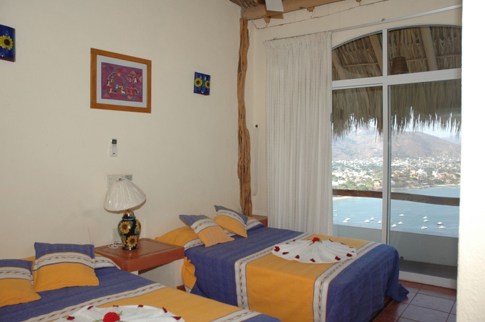Imagen de la habitación del Hotel Villas El Morro. Foto 10