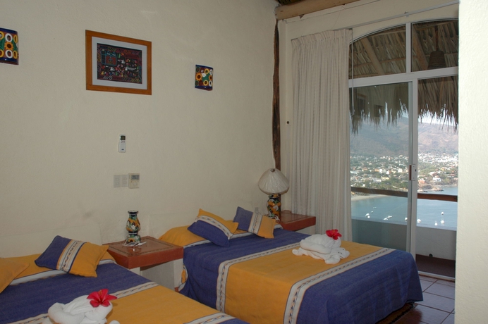 Imagen de la habitación del Hotel Villas El Morro. Foto 12