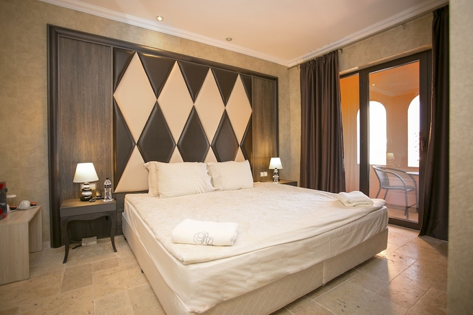 Imagen de la habitación del Hotel Villas Elenite Premium. Foto 11