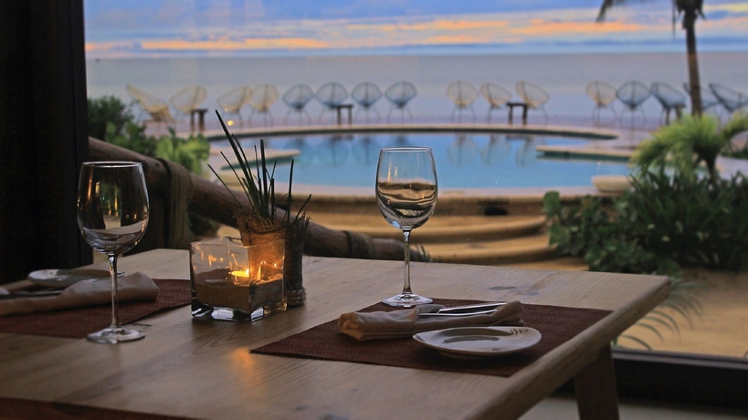 Imagen del bar/restaurante del Hotel Villas Flamingos. Foto 7