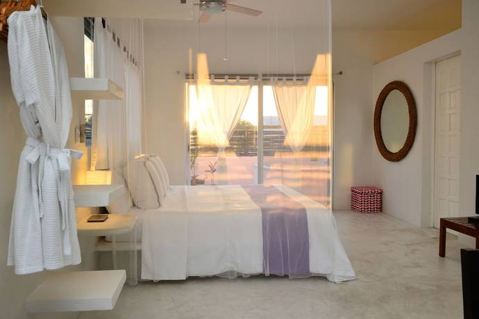 Imagen de la habitación del Hotel Villas Geminis Boutique Condo. Foto 2