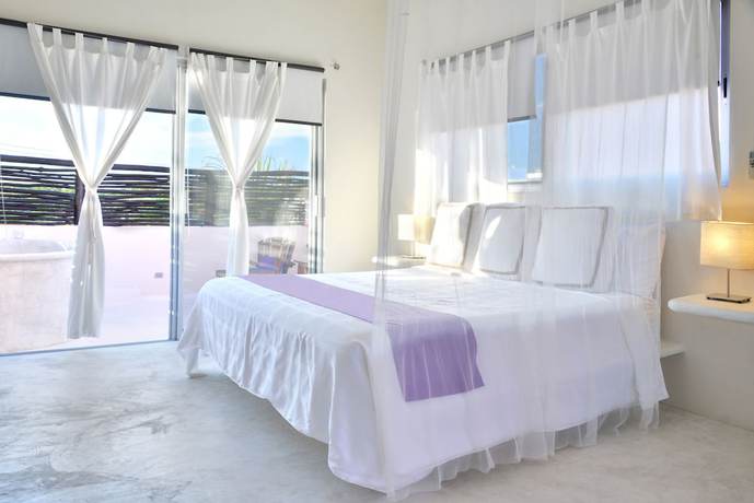 Imagen de la habitación del Hotel Villas Geminis Boutique Condo. Foto 3