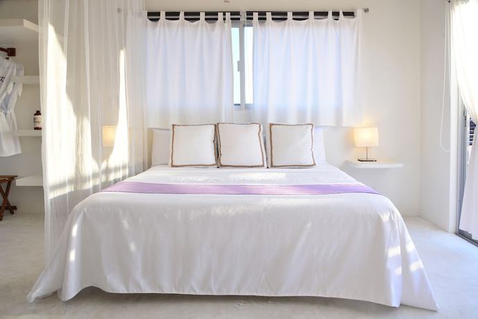 Imagen de la habitación del Hotel Villas Geminis Boutique Condo. Foto 7