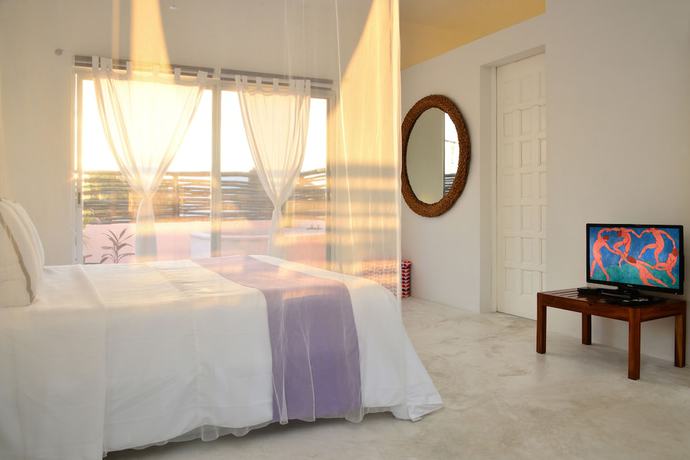 Imagen de la habitación del Hotel Villas Geminis Boutique Condo. Foto 8