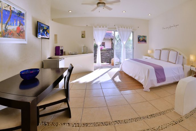 Imagen de la habitación del Hotel Villas Geminis Boutique Condo. Foto 9