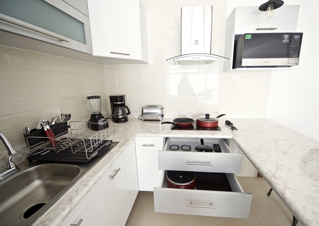 Imagen de la habitación del Hotel Villas Grand Gardenia. Foto 4