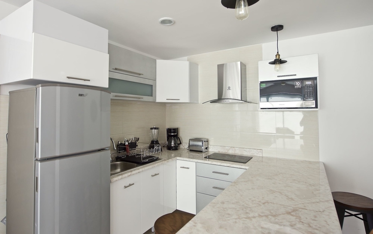 Imagen de la habitación del Hotel Villas Grand Gardenia. Foto 5