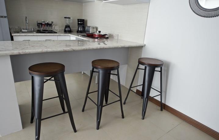 Imagen de la habitación del Hotel Villas Grand Gardenia. Foto 14