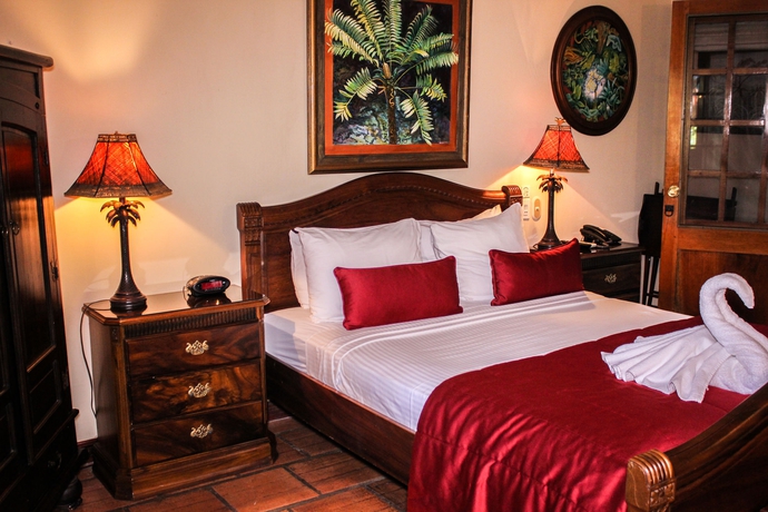 Imagen de la habitación del Hotel Villas Lirio. Foto 4