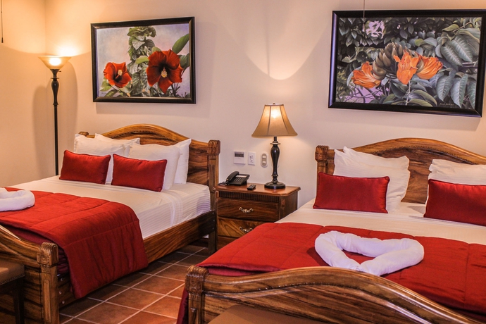 Imagen de la habitación del Hotel Villas Lirio. Foto 6