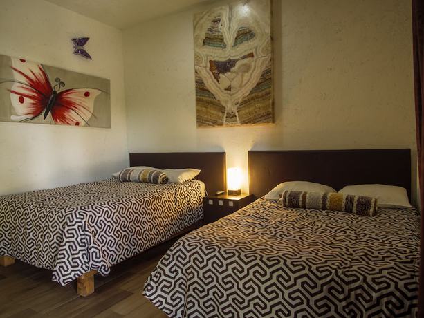 Imagen de la habitación del Hotel Villas Mariposas. Foto 6